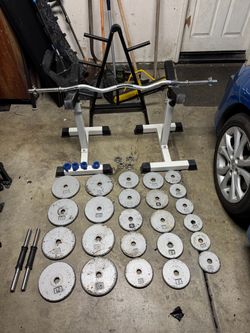 weight set with ez curl bar and stand alone bench spotters