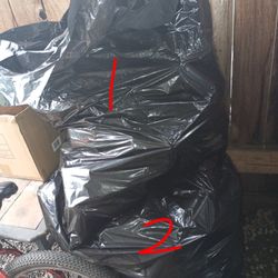 6 Bags Full Of Mixed Recycling Cans