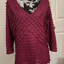 Pleated top for woman size XL Preowned in good condition. Wide V neck. A little see through. Comes from a smoke free environment.