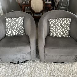 2 Gray Swivel Barrel Chairs