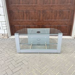 Silver Glass TV Stand Entertainment Center   Delivery available 