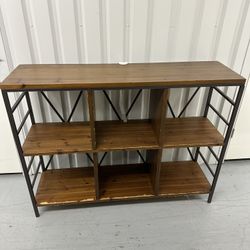 6-cube bookshelf or display shelf unit with a metal frame and wood shelves
