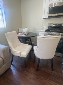 Faux leather chairs, four available