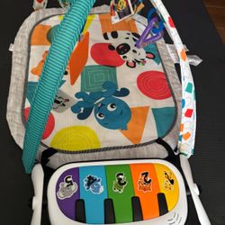 Baby Einstein 4-in-1 Kickin' Tunes Music and Language Discovery Play Gym. 