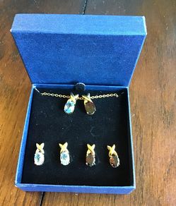 Charming Set. 2 sets of post earrings with matching necklace. Wear one or both pendants on the chain.