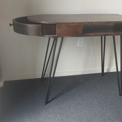 Vintage pencil desk with iron legs