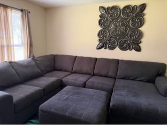 3 piece sectional with ottoman & a 75 inch LG smart TV