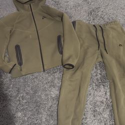 Olive green Nike tech track suit