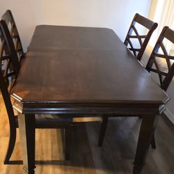 Extendable table and chairs