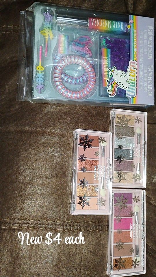 NEW NUEVOS Eyeshadow Palettes, and a set of 2 bobby pins, 2 hair spirals, hair elastics, star unicorn star loose glitter, and glitter mascara. $4 each