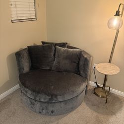 Living Spaces  Oversized Swivel Chair 