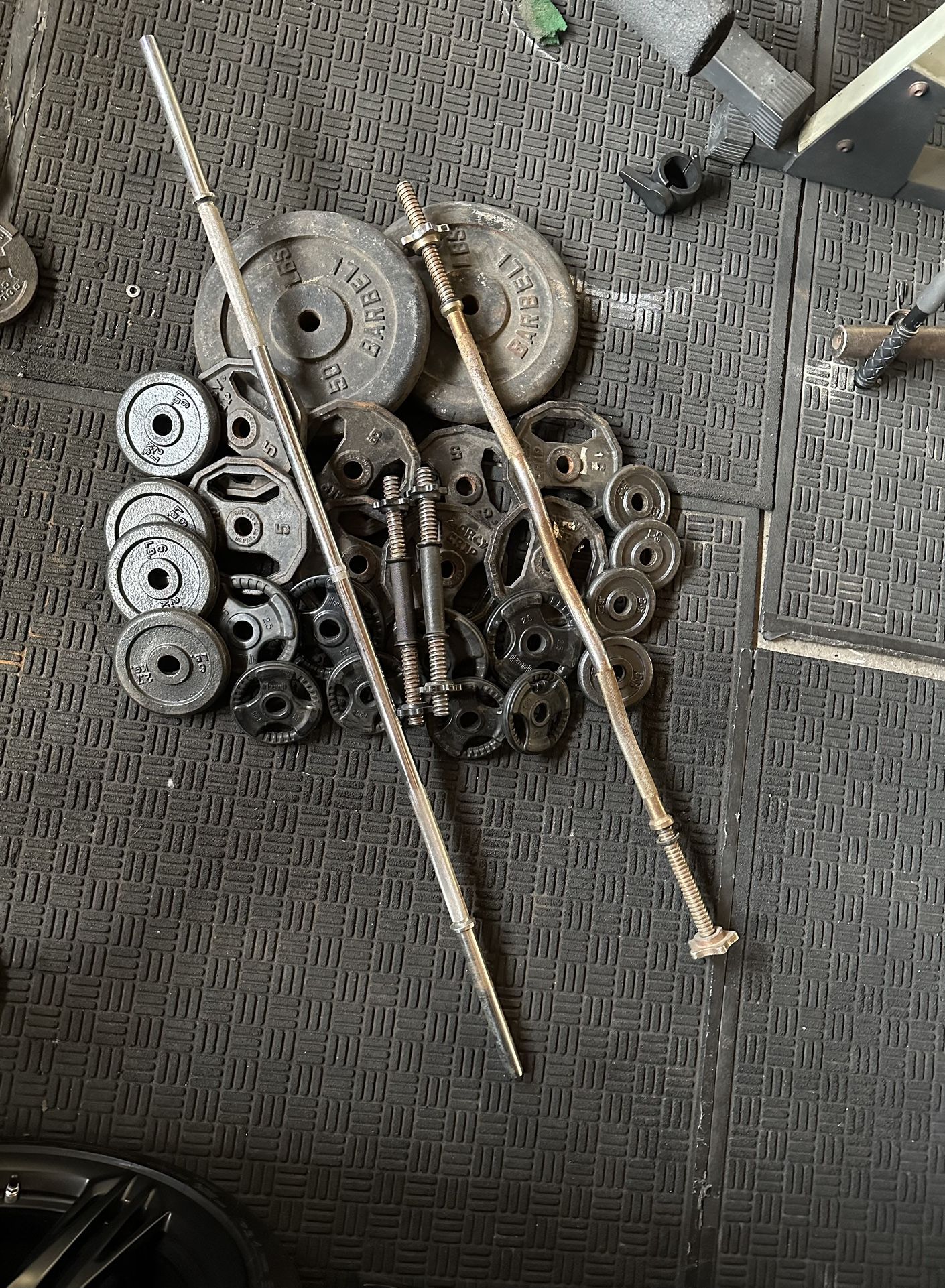 Standard weights 190lbs total with curl bar plus straight bar and adjustable dumbbells handles