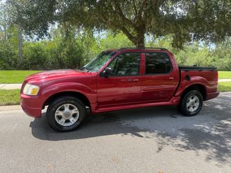 Ford Explorer Sport Trac Red Pickup Truck