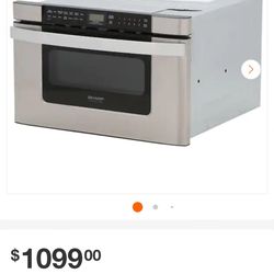 Sharp Microwave. (Brand New In Box Never Installed)