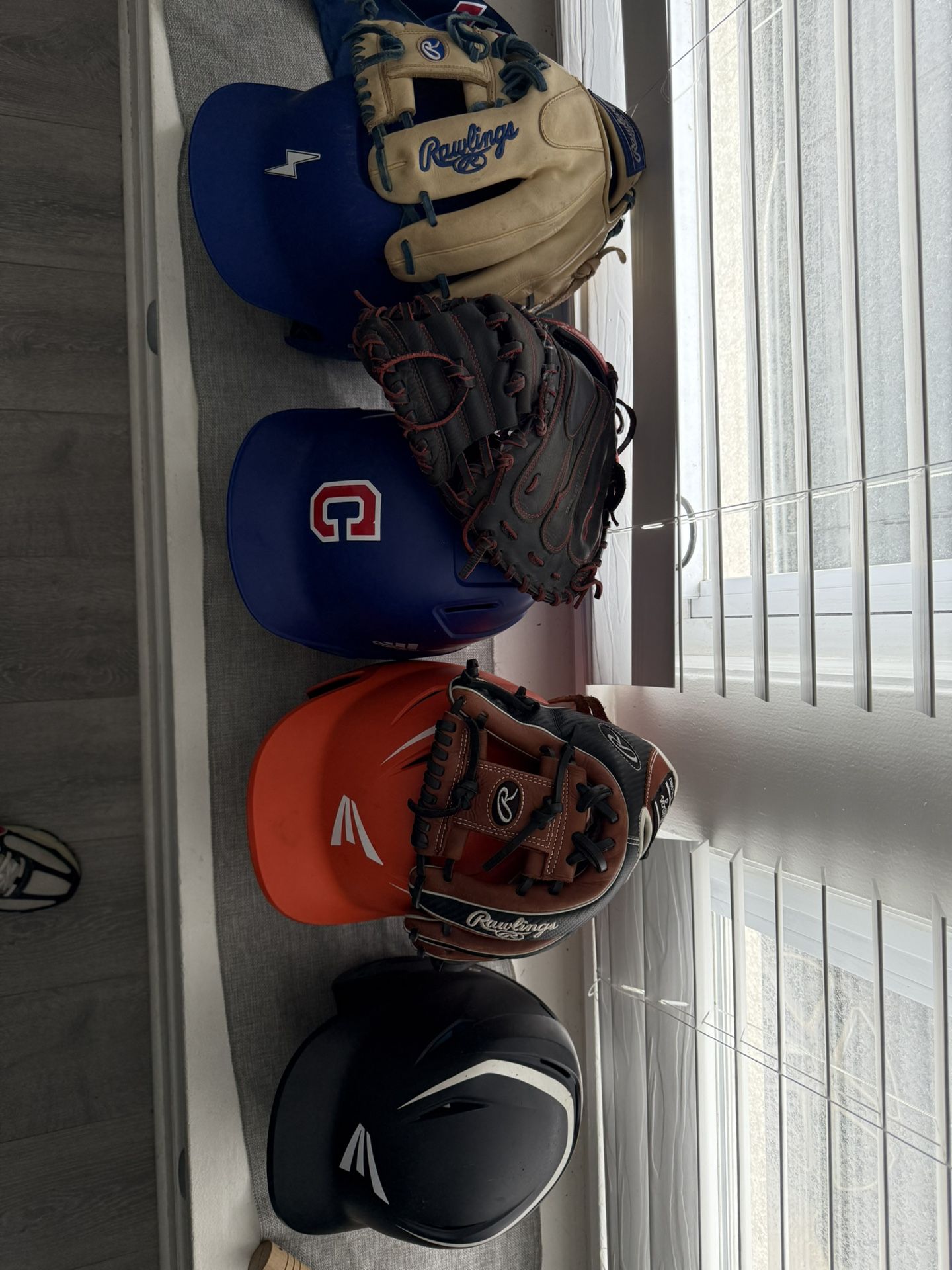 Baseball Gloves And Helmets