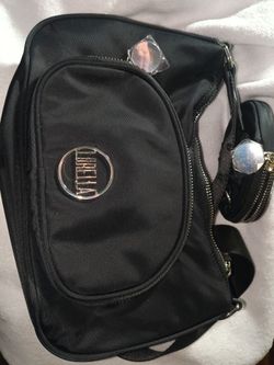 Collectors of bags new with plastic cover over the keychain keyring Lululemon crossbody