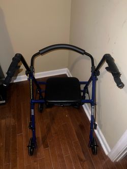 Walker with seat never used! $40 pick up today!