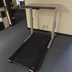 Desk with treadmill