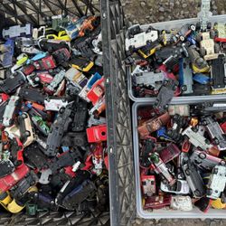 Hundreds of hot wheels and matchbox cars