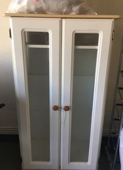 White cabinet with shelves