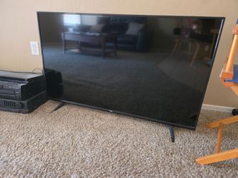 TCL Flat Screen TV with legs