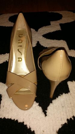 Cute tan heels..peep toe. ..size 10..great condition!