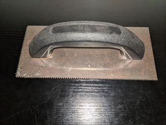 Notched Trowel with Black Handle