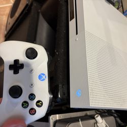 Pristine rarely used complete XBOX ONE S system with 6 games and a controller. 