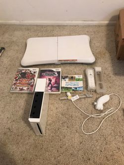 Wii console with board, 3 games, 1 controller