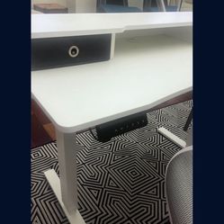 Adjustable height desk