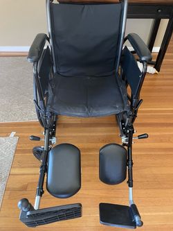 Black Folding Wheelchair with Leg Rests