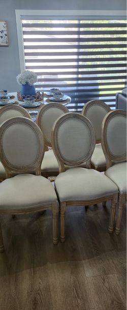 Light wood color chairs
