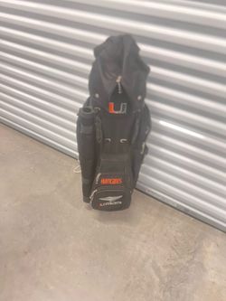 14-Way Miami Hurricanes Golf Bag with Rain Cover Nice. Used in good condition with some cosmetic blemishes. These blemishes are in the form of some
