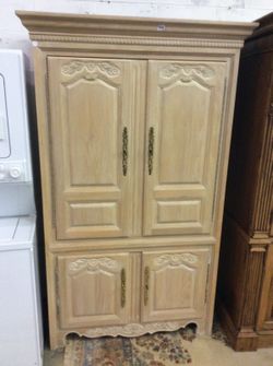 Dresser armoire with drawers and a cupboard