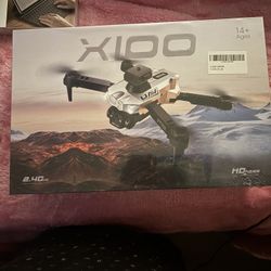 small, foldable RC drone, possibly the X100 model
