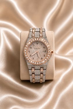 Iced-out silver and rose gold watch