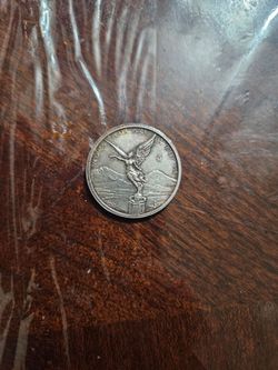 1/4 onza silver coin