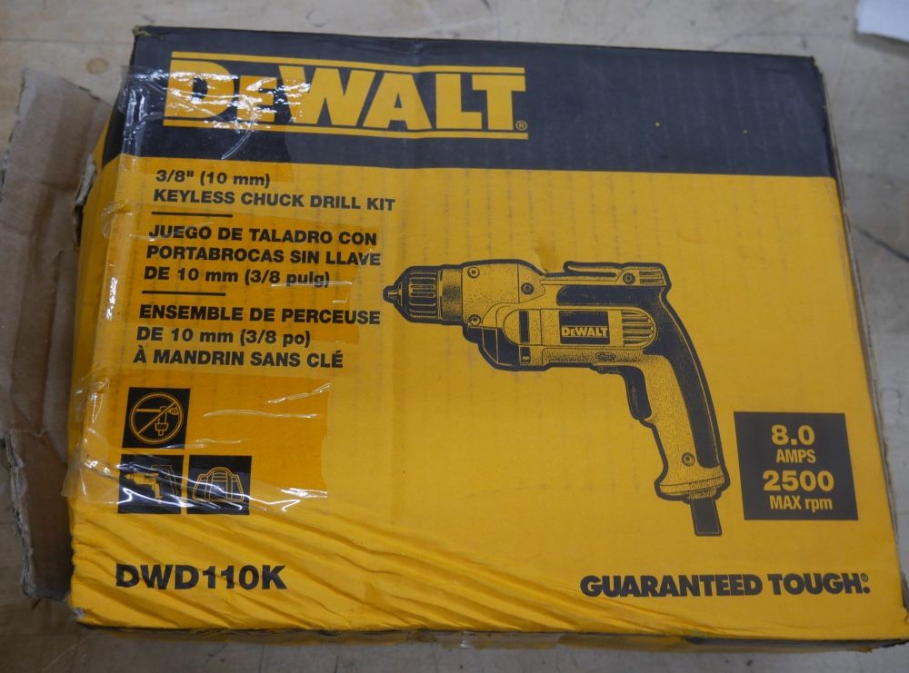 DEWALT DWD110K 3/8 inch Variable Speed Reversible Grip Drill Kit. NEW. OPEN BOX. BOX WAS OPEN FOR INSPECTION.