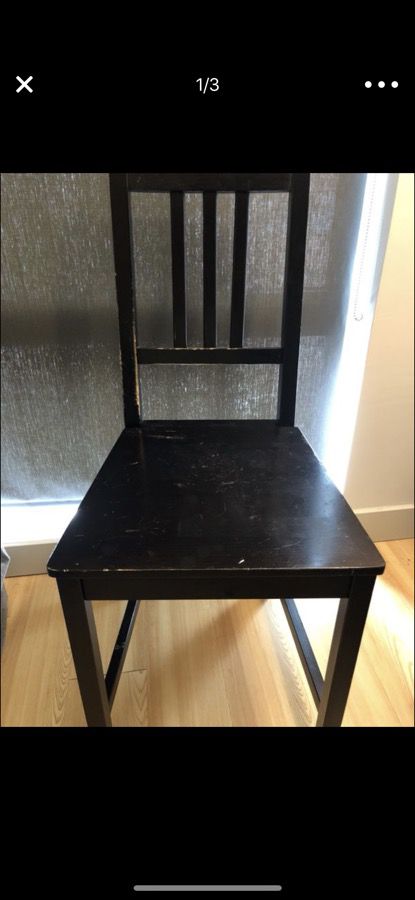 Set of 2 black wooden chairs... used