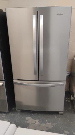 Like new Whirlpool stainless steel refrigerator
