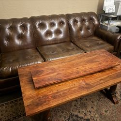 Couch And Solid Wood Coffee Table