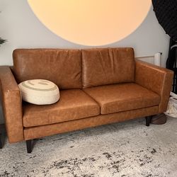 Faux Leather Loveseat With Reversible Cushions