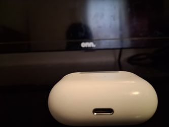 These are Apple AirPods (3rd generation) in their wireless charging case.