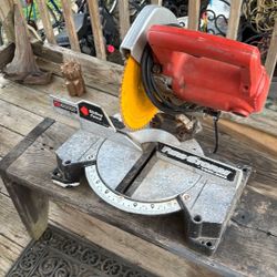 12” chop saw with extending guide rails, new blade , capable