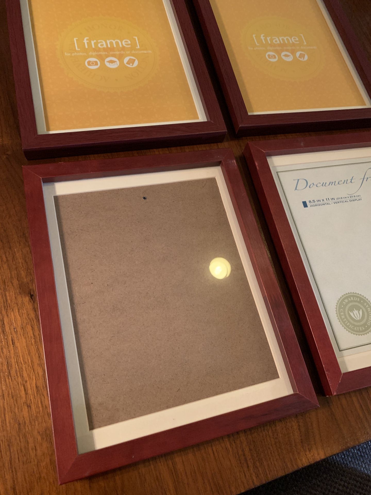 4 wooden picture frames (8.5” x 11”)