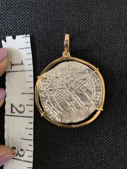 Atocha silver coin with gold bezel