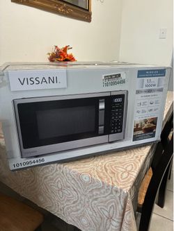 Vissani 1.1cu ft stainless steel microwave (has dent)