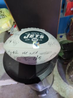 New York Jets lithograph football signed by the whole team with the stamp an official NFL football
