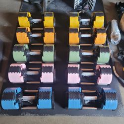 New.  Multi-Color Adjustable Dumbbell Pair From 5 To 70lbs  $550 For Pair. 