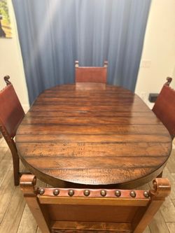 Pottery Barn Dining Table 48” Round with Extension Leaf with 4 chairs
